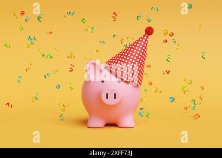 Coriandoli multicolore che cadono su un salvadanaio rosa con un cappello rosso da festa con motivo a punti bianco su sfondo giallo. Investimento redditizio Foto Stock