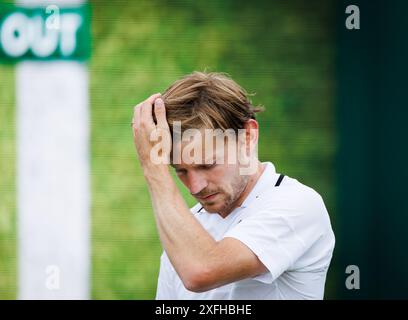 Londra, Regno Unito. 3 luglio 2024. Il belga David Goffin reagisce durante una partita di tennis contro il ceco Machac, nel primo turno del torneo maschile del grande slam di Wimbledon 2024 all'All England Tennis Club, nel sud-ovest di Londra, in Gran Bretagna, mercoledì 03 luglio 2024. BELGA PHOTO BENOIT DOPPAGNE credito: Belga News Agency/Alamy Live News Foto Stock