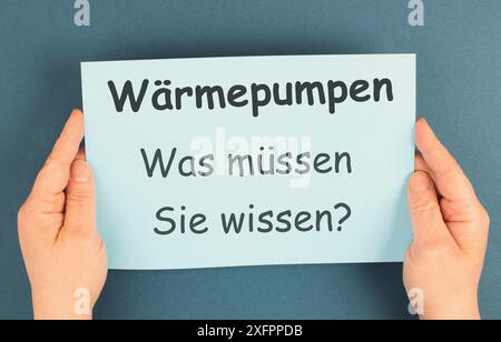 Pompe di calore, cosa è necessario sapere, lingua tedesca, nuova legge sull'energia nell'edilizia, politica di protezione del clima per ridurre le emissioni di CO2 Foto Stock