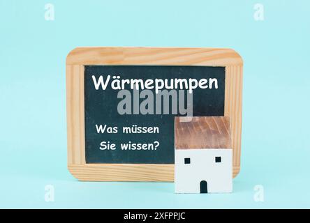 Pompe di calore, quello che dovete sapere, lingua tedesca, nuova legge sull'energia degli edifici, politica di protezione del clima per ridurre le emissioni di co2, casa di ristrutturazione Foto Stock