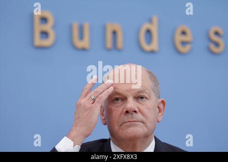 OLAF Scholz, Bundeskanzler, SPD, PK zu - Bundeshaushalt 2025, DEU, Berlino, 05.07.2024 *** Olaf Scholz, Cancelliere federale, SPD, conferenza stampa sul bilancio federale 2025, DEU, Berlino, 05 07 2024 Foto Stock