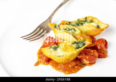 Conchiglino italiano ripieno di spinaci Foto Stock