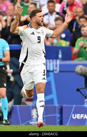 Niclas Fullkrug (9) della Germania reagisce durante una partita di calcio tra le squadre nazionali di Spagna e Germania nei quarti di finale del torneo UEFA Euro 2024 , giovedì 5 luglio 2024 a Stoccarda , Germania . FOTO SPORTPIX | David Catry Foto Stock