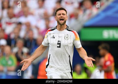 Niclas Fullkrug (9) della Germania reagisce durante una partita di calcio tra le squadre nazionali di Spagna e Germania nei quarti di finale del torneo UEFA Euro 2024 , giovedì 5 luglio 2024 a Stoccarda , Germania . FOTO SPORTPIX | David Catry Foto Stock