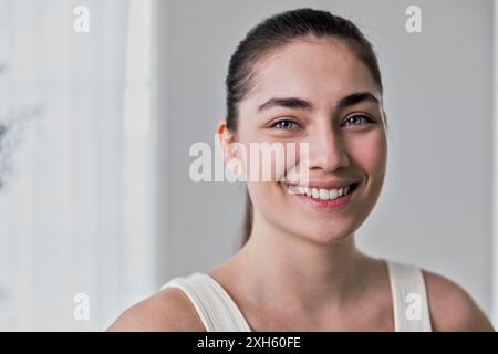 portrait of young woman  doing workout training at home Stock Photo