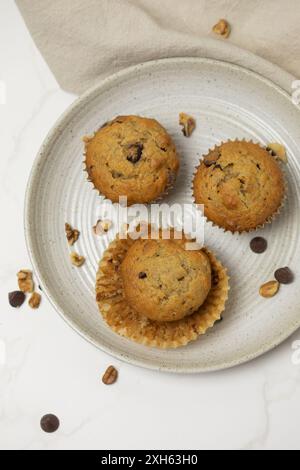 Top view of three muffins on a plate Stock Photo