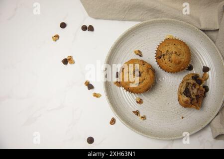 Top view of three muffins on a plate with room for graphics Stock Photo