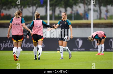 Reykjavik, Islanda. 12 luglio 2024. Calcio, donne, qualificazioni al Campionato europeo, Islanda - Germania, Lega A, gruppo 4, giorno 5, i giocatori tedeschi si stanno riscaldando. Crediti: Brynjar Gunnarsson/dpa/Alamy Live News Foto Stock