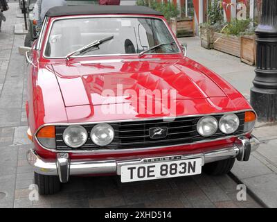 Auto d'epoca Red Triumph Stag Sports tourer Foto Stock