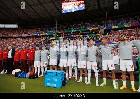 Panchina di giocatori polacchi firma inno durante la partita di UEFA Euro 2024 tra le squadre nazionali di Polonia e Austria all'Olympiastadion, Berlino, Germania (M Foto Stock