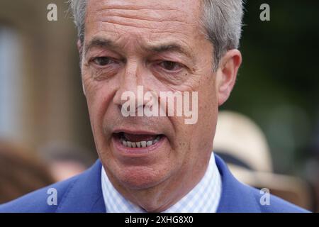 Wimbledon, Londra, Regno Unito. 14 luglio 2024 NIGEL FARAGE, leader del partito riformato e neoeletto membro del Parlamento per Clacton-on-Sea arriva per la finale maschile all'All England Lawn Tennis Club il giorno 14 dei campionati di Wimbledon. Crediti: Amer Ghazzal/Alamy Live News Foto Stock