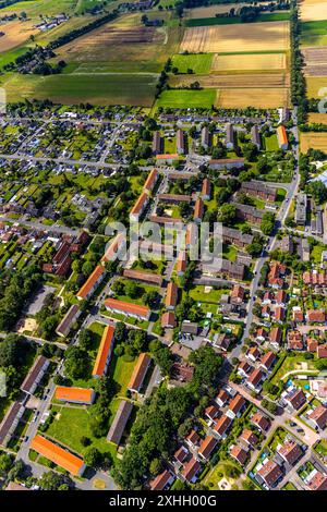 Luftbild, Reihenhaus-Mietshäuser Wohnsiedlung Kurt-Schumacher-Straße, Theodor-Heuss-Straße und Herringer Heide, Stadtbezirk Herringen, Hamm, Ruhrgebiet, Nordrhein-Westfalen, Deutschland ACHTUNGxMINDESTHONORARx60xEURO *** Vista aerea, condomini a schiera che ospitano gli immobili Kurt Schumacher Straße, Theodor Heuss Straße e Herringer Heide, distretto di Herringen, Hamm, regione della Ruhr, Renania settentrionale-Vestfalia, Germania ACHTUNGxMINDESTHONORARx60xEURO Foto Stock