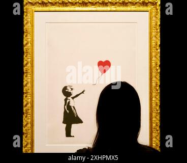 Portogallo, regione del Nord, Porto, Banksy, Genius o Vandal al Centro Congressi Alfandega, Girl with Balloon Foto Stock