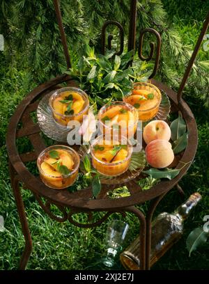Pesche cotto in Muscat Foto Stock