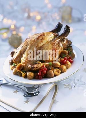 Il cappone con carote Foto Stock