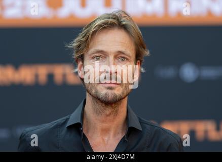 Berlino, Germania. 16 luglio 2024. L'attore Andreas Pietschmann partecipa alla prima del film "Die Ermittlung" allo Zoo-Palast. Il film sarà distribuito nei cinema il 25 luglio 2024. Crediti: Monika Skolimowska/dpa/Alamy Live News Foto Stock