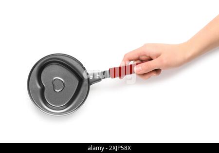 Padella femminile a forma di cuore su sfondo bianco Foto Stock