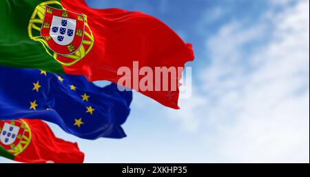 Primo piano delle bandiere del Portogallo e dell'Unione europea che sventolano in una giornata limpida. Democrazia e politica. Tessuto ondulato, rendering di illustrazioni 3D. Selettivo per Foto Stock