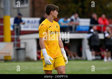 Briton Ferry, Galles. 23 luglio 2024. Il portiere Sam Seager di Swansea City durante l'amichevole tra Briton Ferry Llansawel e Swansea City Under 18 a Old Road a Briton Ferry, Galles, Regno Unito, il 23 luglio 2024. Crediti: Duncan Thomas/Majestic Media. Foto Stock