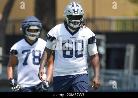 OXNARD, CA - LUGLIO 25: L'offensive tackle dei Dallas Cowboys Tyler Guyton (60) cammina sul campo durante il training camp della squadra a River Ridge Playing Fields il 25 luglio 2024 a Oxnard, CA. (Foto di Brandon Sloter/immagine di Sport) Foto Stock