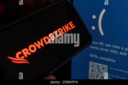 L'illustrazione di un errore critico nell'aggiornamento del software CrowdStrike ha causato una schermata blu di morte sui computer Windows intorno, a Delhi, India. 21 luglio Foto Stock