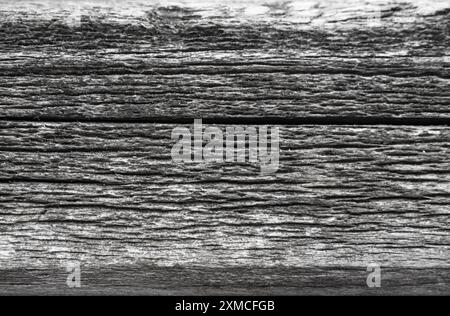 Primo piano dettagliato di tavole di legno intemperie su una superficie rustica Foto Stock