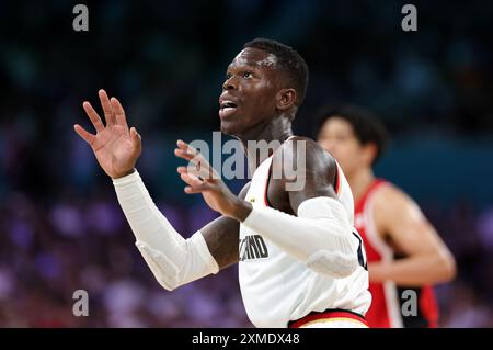 LILLE, FRANCIA - LUGLIO 27: Dennis Schröder della Germania durante la fase A gironi maschile - partita di gruppo A tra Germania e Giappone il primo giorno dei Giochi Olimpici di Parigi 2024 allo Stade Pierre Mauroy il 27 luglio 2024 a Lille, Francia. © diebilderwelt / Alamy Live News Foto Stock