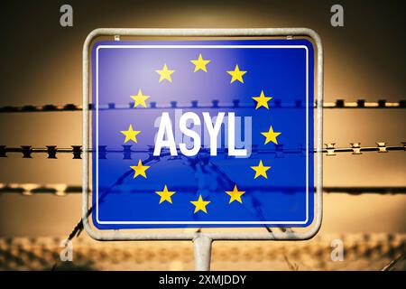 FOTOMONTAGE, EU-Schild mit Aufschrift Asyl und Stacheldraht, Symbolfoto Sicherung der EU-Außengrenzen **** FOTOMONTAGE, cartello UE con iscrizione asilo e filo spinato, foto simbolica che protegge le frontiere esterne dell'UE Foto Stock