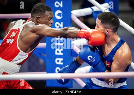 Parigi, Frankrig. 31 luglio 2024. Nikolai Terteryan, Danimarca, sta pugilando contro Makan Traore, Francia nei 71 kg. Lezione alle Olimpiadi di Parigi mercoledì 31 luglio 2024. (Foto: Mads Claus Rasmussen/Ritzau Scanpix) credito: Ritzau/Alamy Live News Foto Stock