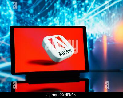 Germania. 1 agosto 2024. In questa immagine, un logo Adobe Inc visualizzato su un tablet. Credito: SOPA Images Limited/Alamy Live News Foto Stock