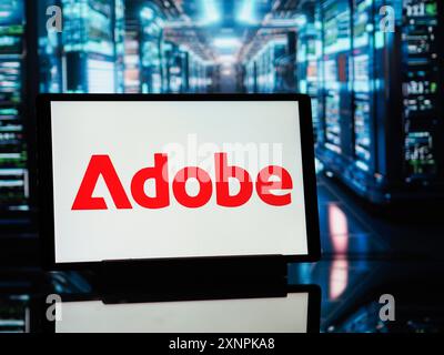 Germania. 1 agosto 2024. In questa immagine, un logo Adobe Inc visualizzato su un tablet. Credito: SOPA Images Limited/Alamy Live News Foto Stock