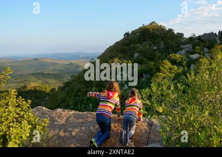 Family travel with children, kids looking from mountain viewpoint, holiday vacation in South Africa Stock Photo