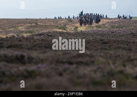 Lauder, Regno Unito. 3 agosto 2024. Lauder Common Riding, Lauder è uno dei Border Common Ridings originali, con riferimenti al festival che risale agli anni '1600, che è stato interrotto a metà degli anni '1800 prima di essere ripristinato nel 1911, prendendo il posto d'onore nel calendario di Lauderdale ogni anno. Ryan Murray Lauder Cornet e Standard Bearer 2024 Jake Mirley (Cornet 2023) uomo destro Elliot Balson (Cornet 2022) uomo sinistro ? ( Crediti: Rob Gray/Alamy Live News Foto Stock