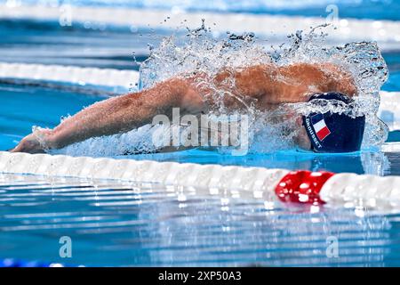 Parigi, Francia. 3 agosto 2024. Maxime Grousset di Francia gareggia nella finale di nuoto 100m Butterfly Men durante i Giochi Olimpici di Parigi 2024 presso la Defense Arena di Parigi (Francia), il 3 agosto 2024. Crediti: Insidefoto di andrea staccioli/Alamy Live News Foto Stock