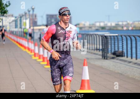 28 luglio 2024, T100 Triathlon World Series MEN's Race, London Docklands, UK. Sam Long degli Stati Uniti sulla corsa della corsa. Foto Stock