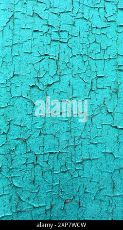 Texture di vernice scricchiolata di ciano in stile grunge. Colori luminosi turchesi. Foto Stock