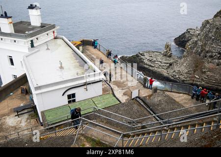 scenderai fino al faro a luce ovest di rathlin, isola di rathlin, contea di antrim, irlanda del nord, regno unito Foto Stock