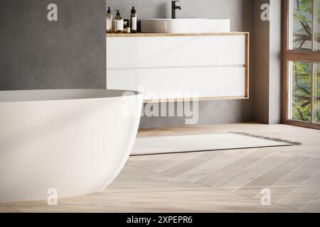 Bagno interno moderno con pareti scure, lavabo in marmo con doppio specchio, vasca, pavimento in parquet. Bagno nero minimalista con arredi moderni Foto Stock