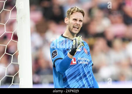 Herning, Danimarca. 6 agosto 2024. Il portiere Elias Olafsson, FC Midtjylland reagisce quando il Midtjylland incontra Ferencvaros dall'Ungheria nel terzo turno di qualificazione della UEFA Champions League 1° incontro a Herning martedì 6 agosto 2024. Crediti: Ritzau/Alamy Live News Foto Stock