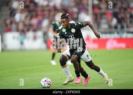 Herning, Danimarca. 6 agosto 2024. Kehinde Oluwatosin, Ferencvaros in azione quando il Midtjylland incontra Ferencvaros dall'Ungheria nel terzo turno di qualificazione della UEFA Champions League 1° partita a Herning martedì 6 agosto 2024. Crediti: Ritzau/Alamy Live News Foto Stock