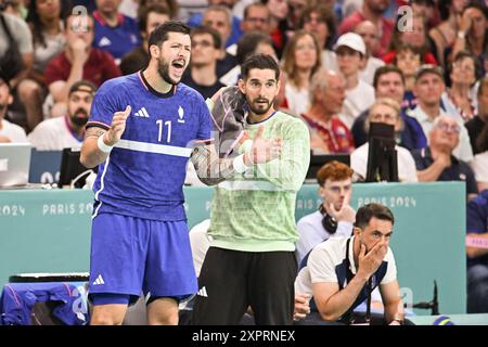 Lille, Francia. 7 agosto 2024. Nicolas Tournat (11) e il portiere francese Remi Desbonnet (92) durante la partita dei quarti di finale maschile tra la Germania e la Francia il dodicesimo giorno dei Giochi Olimpici di Parigi 2024 allo Stade Pierre Mauroy il 7 agosto 2024 a Lille, Francia. Foto di Laurent Zabulon/ABACAPRESS. COM credito: Abaca Press/Alamy Live News Foto Stock