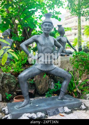 Scultura al Wat po che mostra i principi del massaggio tailandese (Bangkok/Thailandia) Foto Stock