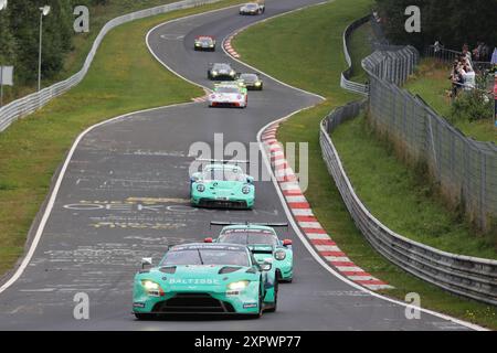 #17 Maxime Dumarey (BEL) / Marek Boekmann (Lautersheim/DEU) / Simon Balcaen (BEL), Aston Martin Vantage AMR GT3, Team: PROsport-Racing (DEU), vor #4 Nico Menzel (Kelberg/DEU) / Timo Glock (DEU), Porsche 911 GT3 911-R, Team: Falken Motorsport (DEU) Falken Motorsport (DEU), Motorsport, Deutschland, Nuerburgring Langstrecken serie, NLS04, Lauf 6, 6H ADAC Ruhr-Pokal Rennen, 03.08.2024 foto: Eibner-Pressefoto/Juergen Augst Foto Stock