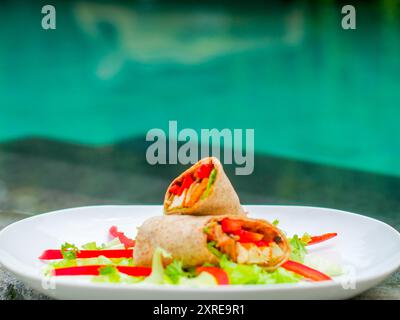 cena con burrito vegano Foto Stock