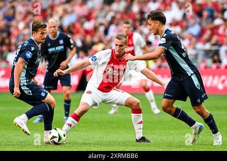 AMSTERDAM - (l-r) Simon Olsson di sc Heerenveen, Sivert Mannsverk di Ajax, Espen van EE di sc Heerenveen durante l'incontro olandese Eredivisie tra Ajax Amsterdam e SC Heerenveen alla Johan Cruijff Arena l'11 agosto 2024 ad Amsterdam, Paesi Bassi. ANP OLAF KRAAK Foto Stock