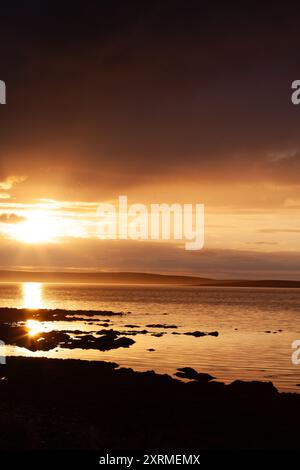 Tramonto su Stronsay a Midsummer, Orcadi, Scozia Foto Stock