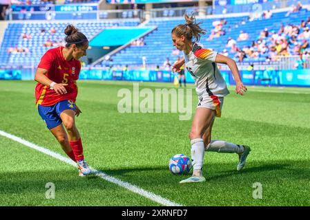 Lione, Francia. 09 agosto 2024. Jule Brand, DFB Frauen 16 competono per il pallone, tackle, duello, header, zweikampf, azione, lotta contro Oihane Hernandez, Spagna 5 alla medaglia di bronzo olimpica femminile GERMANIA - SPAGNA 1-0 allo Stade de Lyon di Lione il 9 agosto 2024 a Lione, Francia. Stagione 2024/2025 fotografo: ddp Images/STAR-Images credito: ddp media GmbH/Alamy Live News Foto Stock