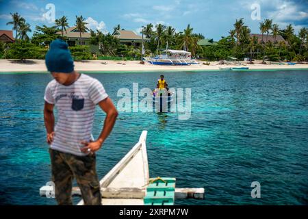 Barca locale per Bounty Beach, Malapascua Island, Cebu, Filippine Bounty Beach Malapascua Island Cebu Filippine Visayan Sea Sun Sunny Tropical holid Foto Stock