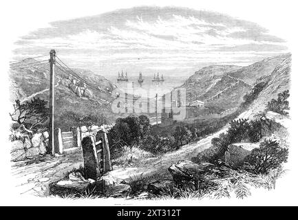 Falmouth, Gibilterra e Mediterranean Telegraph: Le scogliere di Porthcurnew Bay, Cornovaglia, 1870. "Il completamento con successo del telegrafo sottomarino line...in con i telegrafi anglo-mediterranei e i telegrafi sommergibili delle Indie britanniche, per formare una comunicazione sottomarina diretta dall'India all'Inghilterra... è stato annunciato, con soddisfazione del pubblico... Porthcurnew Bay... è stato il luogo di approdo del cavo telegrafico Mid-Channel, che comunica con la nave di segnalazione,...per fornire informazioni sulle navi che entrano o partono dal canale britannico...la nave a vapore a vite fr Foto Stock