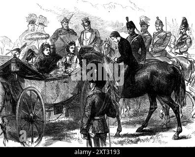 Il Principe Imperiale francese alla Queen's Review of the Guards a Bushey Park, [West London], 1871. "La revisione della Household Brigade... di sua Maestà la Regina, è stata gestita con successo ed è stata favorita con un clima luminoso e piacevole. La Regina, in una carrozza aperta disegnata da quattro grigi, era accompagnata dal Principe Leopoldo e dalla Principessa Beatrice, con la Duchessa di Roxburghe e l'On. Mary Pitt alla presenza. Fu incontrata a Bushey Park dal Principe e Principessa di Galles, e la Principessa di Galles prese posto nella carrozza della Regina. Anche il principe Arturo e il duca di Cambridge joi Foto Stock